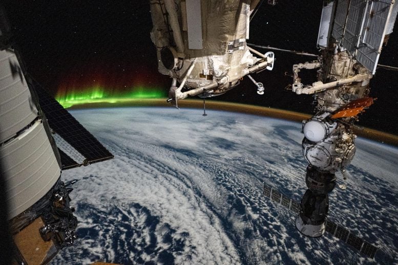 The Aurora and the Atmospheric Glow crown the Earth's Horizon